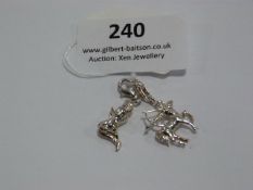 *Two Silver Charms