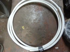Small Roll of White Plastic Piping