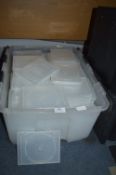 Plastic Tub Containing CD Cases