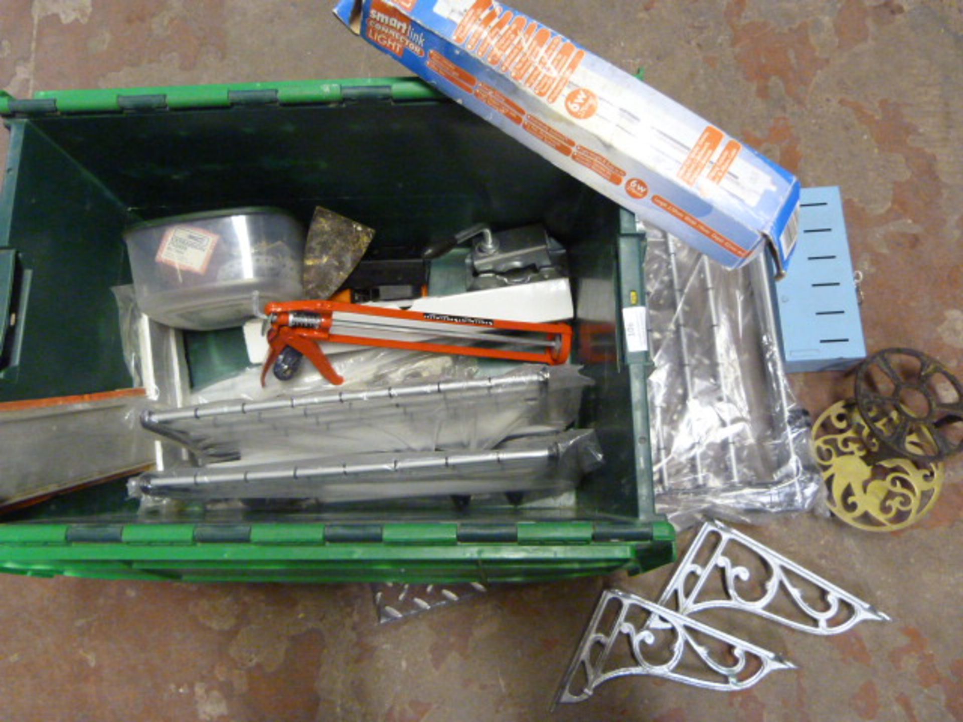 Box of Assorted Iron Brackets, Trivets, Cash Tin,