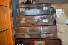 Three Vintage Leather Suitcases