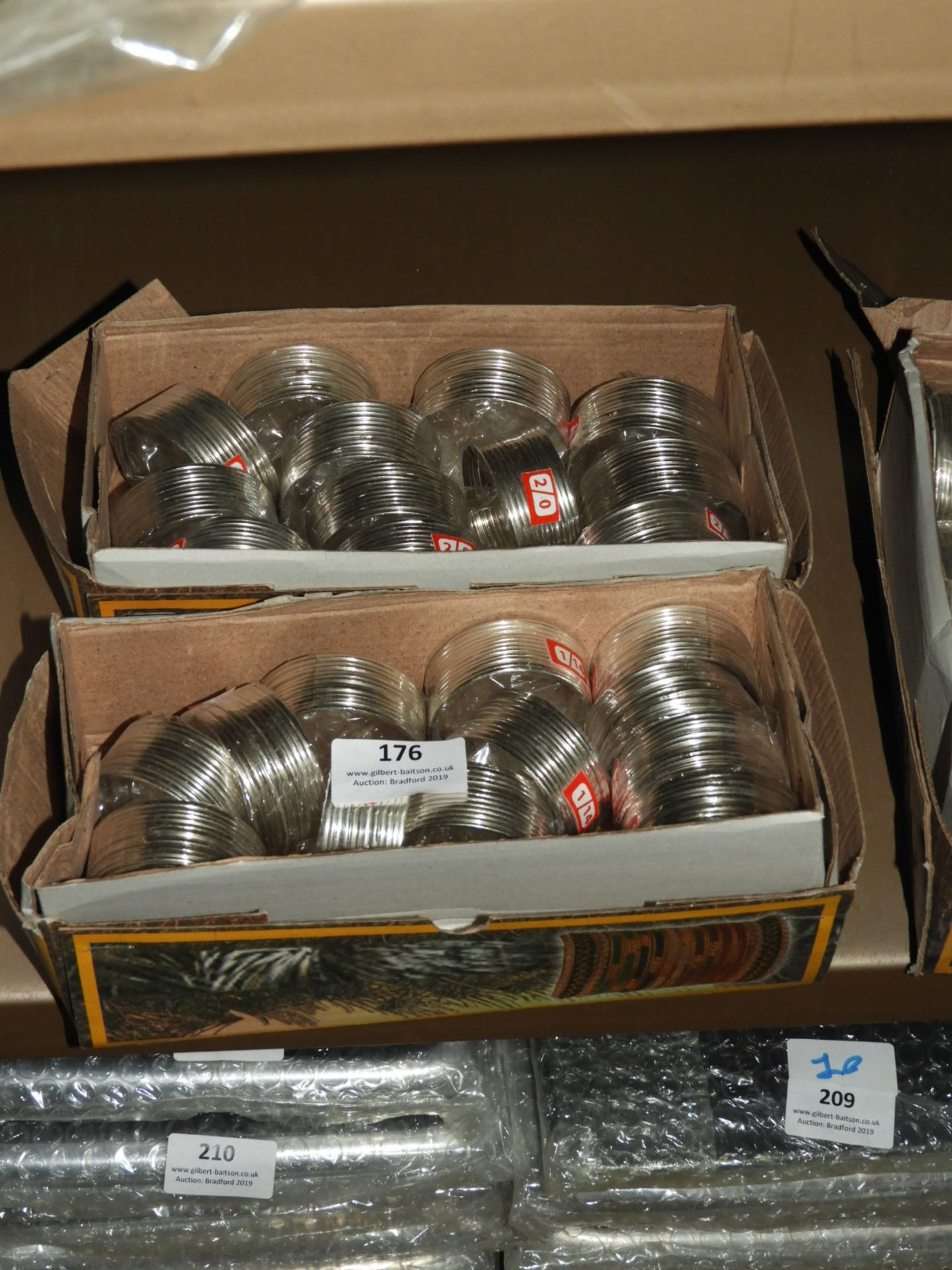 Two Boxes of Asian Style Silver Bangles