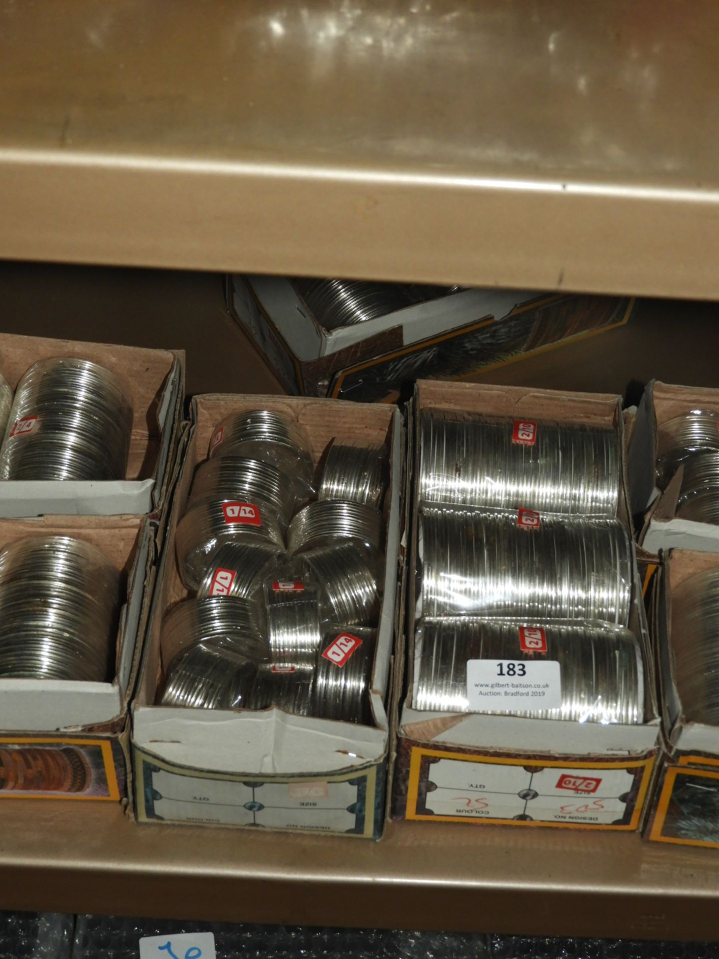 Two Boxes of Asian Style Silver Bangles