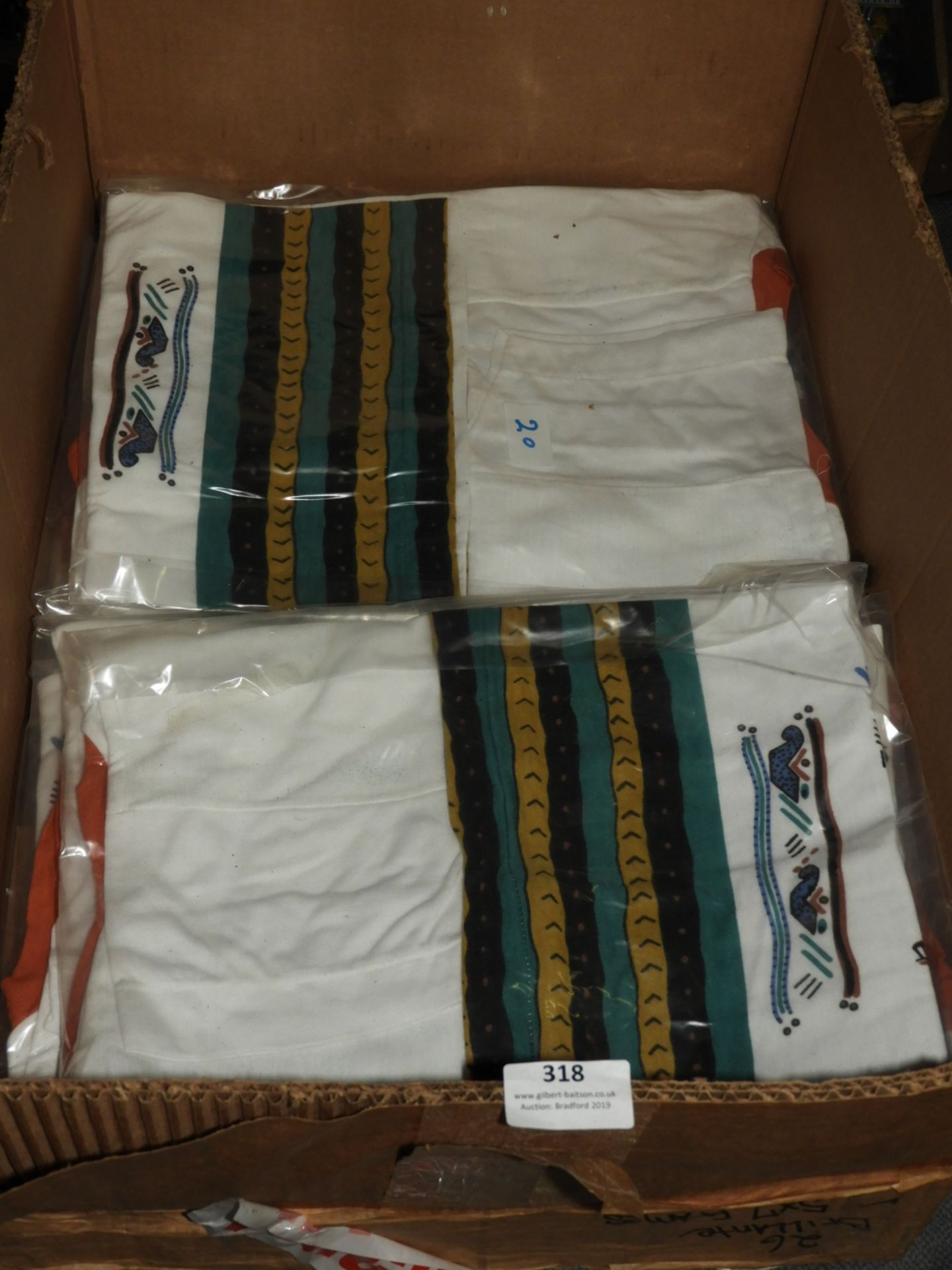 Box Containing Aztec Style Printed T-Shirts