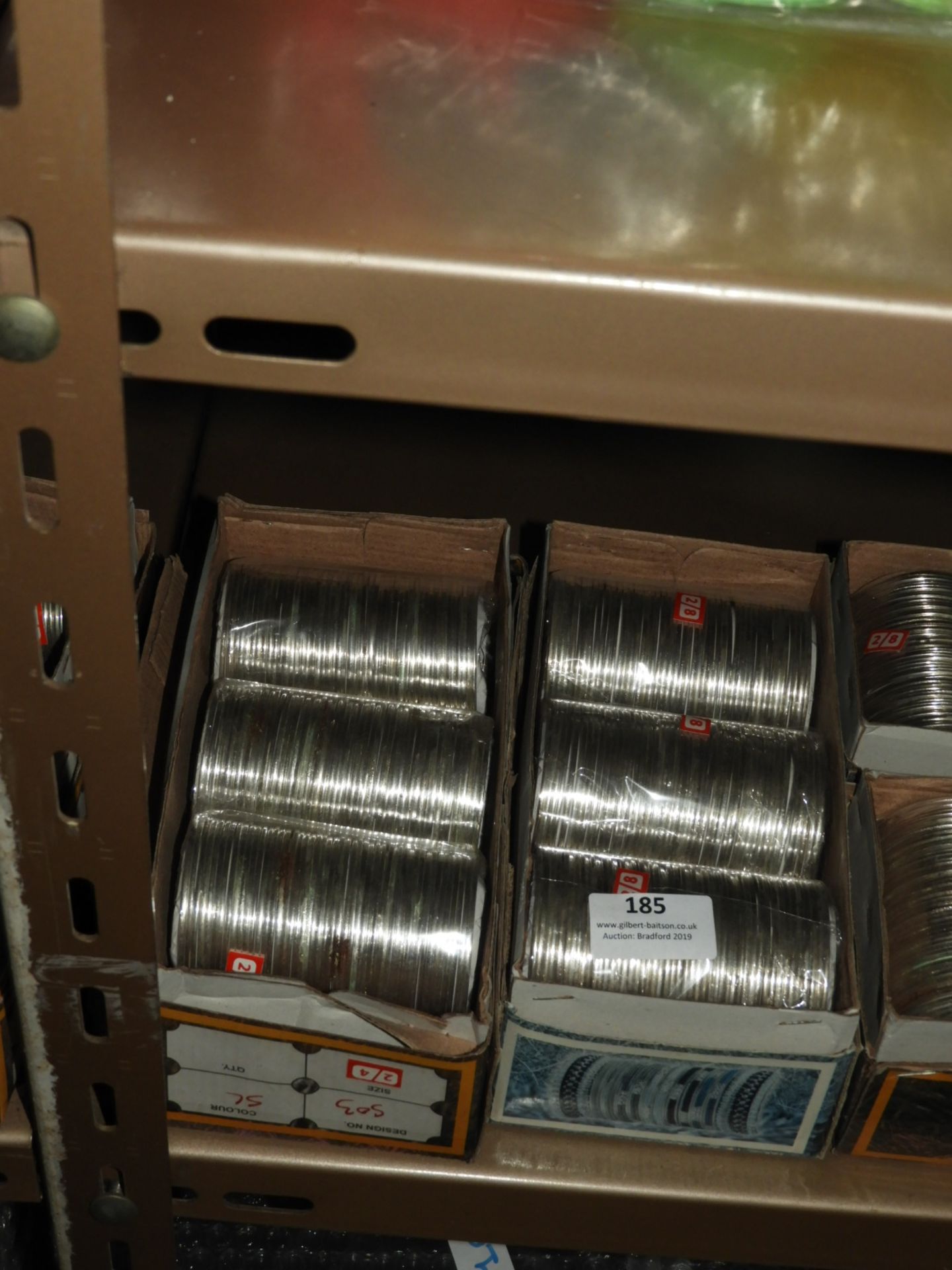 Two Boxes of Asian Style Silver Bangles