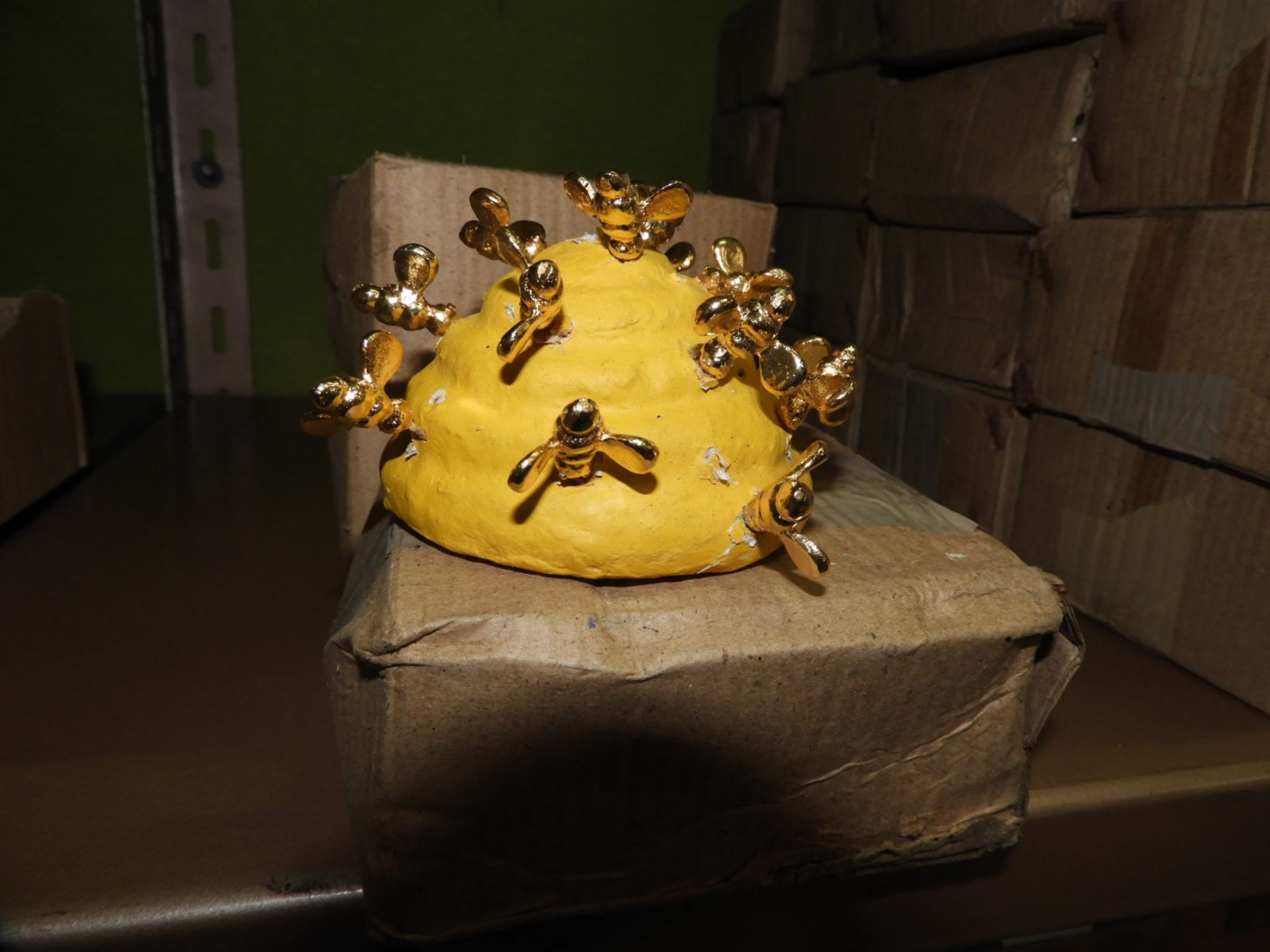 Sixteen Decorative Beehive Ornaments with Gold Col