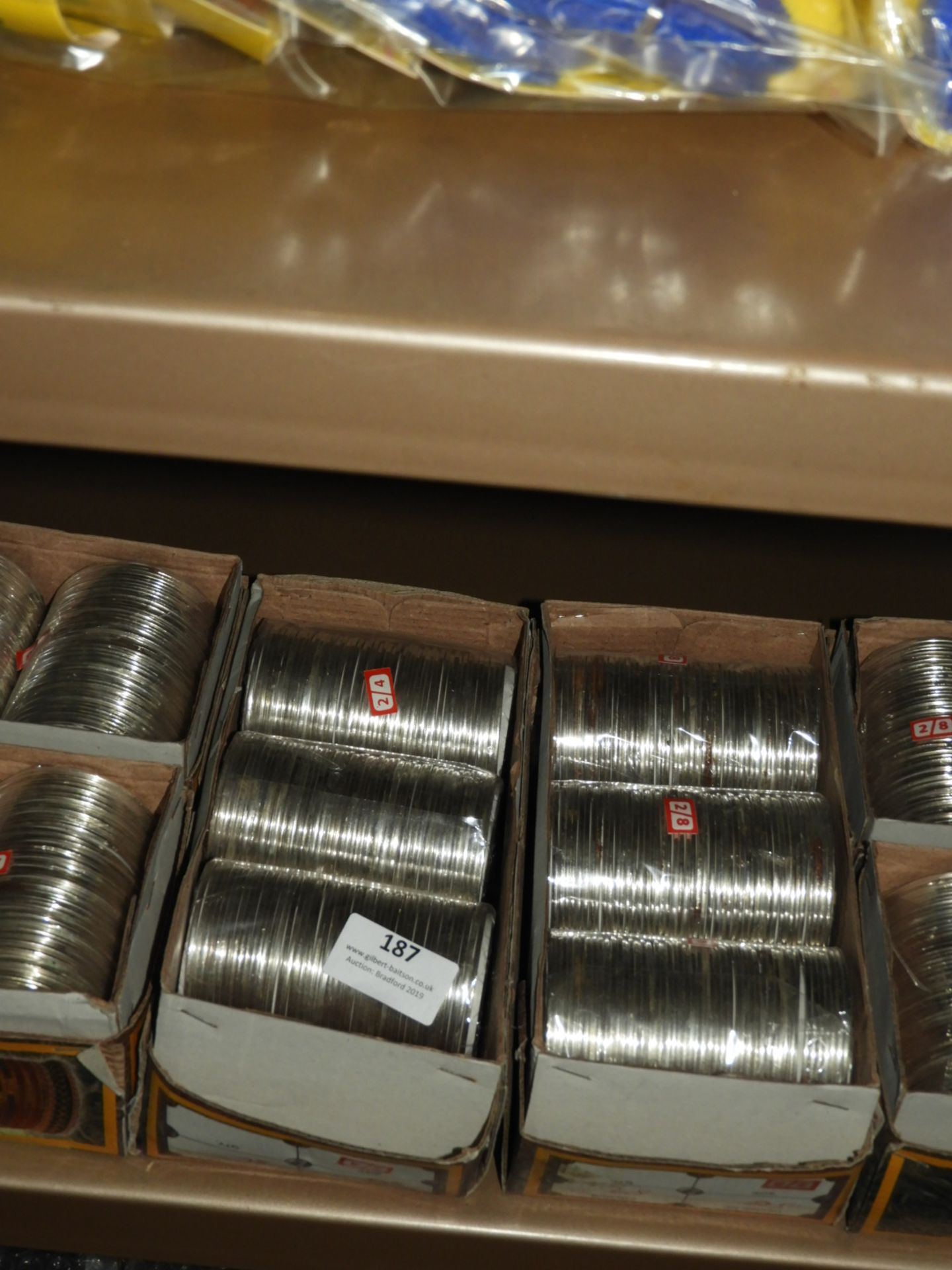 Two Boxes of Asian Style Silver Bangles