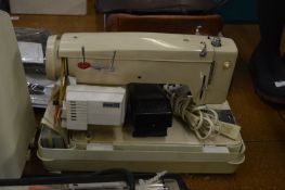 *Cased Jones Electric Sewing Machine