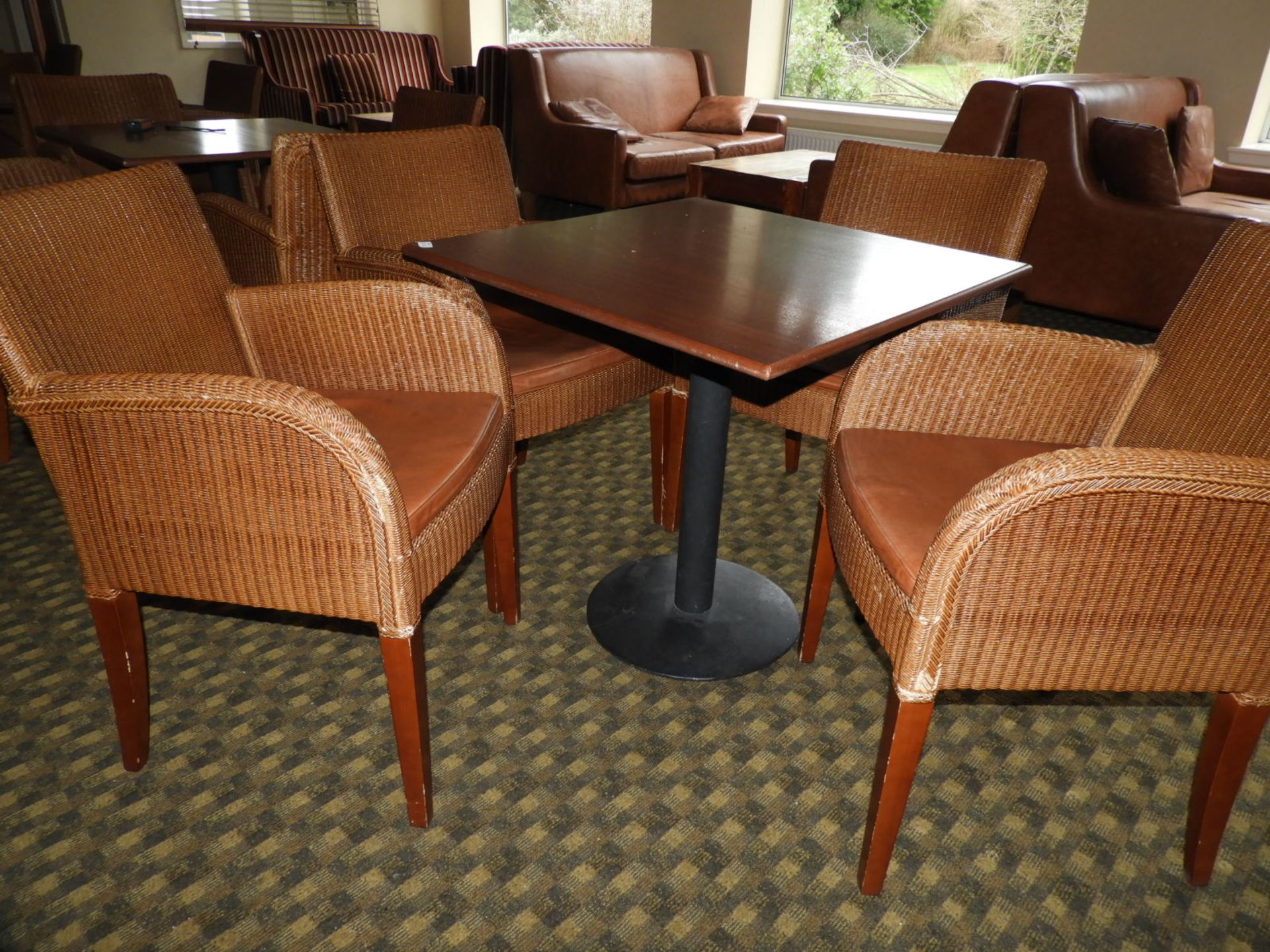 *Set of Four Rattan Dining Chairs with Faux Leathe