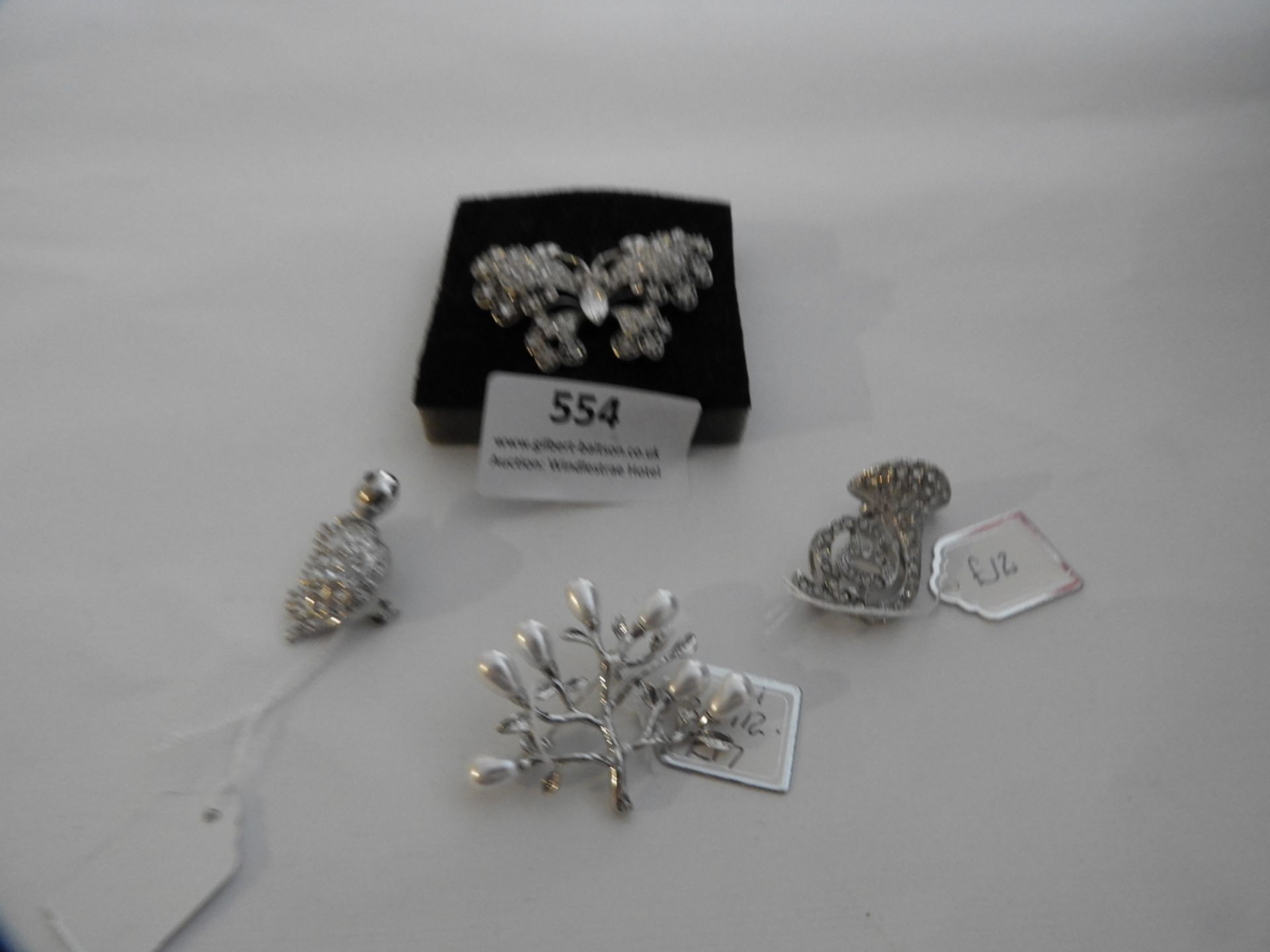 *Four Assorted Brooches Including; Butterfly, Tort