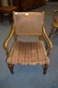 Cane Backed Upholstered Armchair