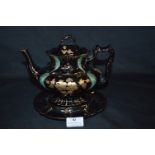 Black Ceramic Teapot on Stand