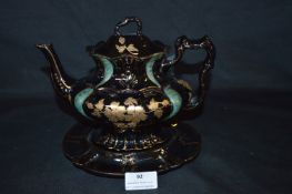 Black Ceramic Teapot on Stand