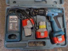Makita Drill with Batteries and Charger