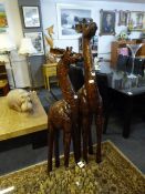 Pair of Wooden Giraffe Statuettes 59" and 51"