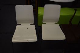*Pair of White Stackable Chairs