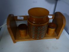 Wooden Book Rack and Three Hornsea Pottery Items