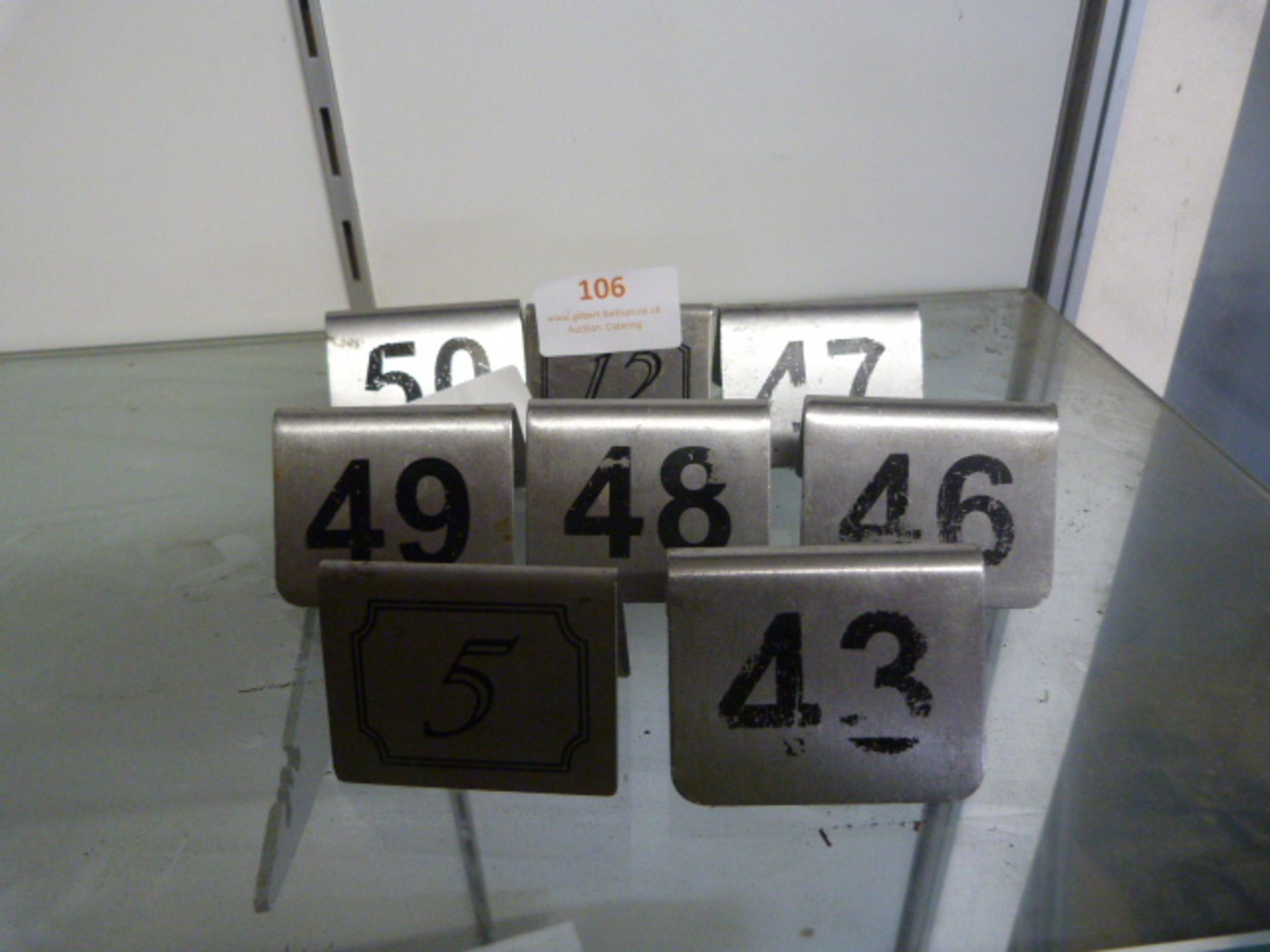 *Eight Metal Table Numbers