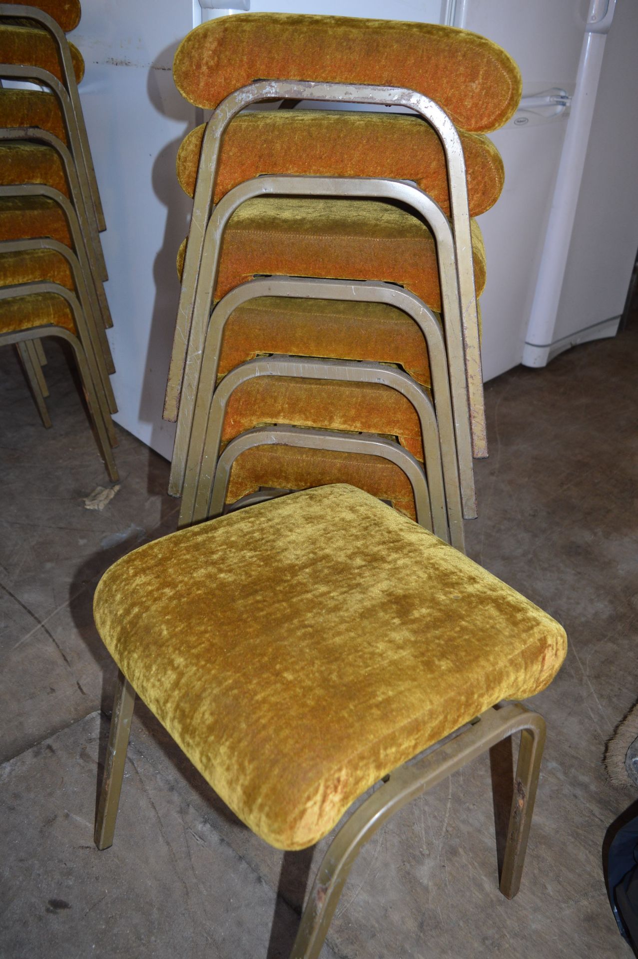 Seven Stackable Metal Framed Upholstered Stools