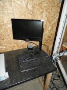 Flatscreen Monitor, Two Keyboards, Mouse and a Bar