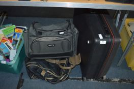 Suitcase and a Quantity of Bags