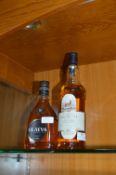 Bottle of Glaver Liqueur and a Bottle of Glen Garr