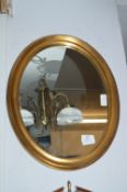 Small Gilt Framed Oval Wall Mirror