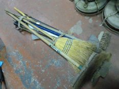 Bundle of Brushes and Garden Tools