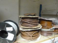 Eight Spools of Brown and One Spool of White Wire