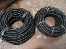 *Two Coils of Plastic Hose