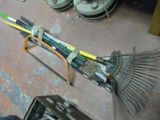 Bundle of Garden Tools and Drain Rods