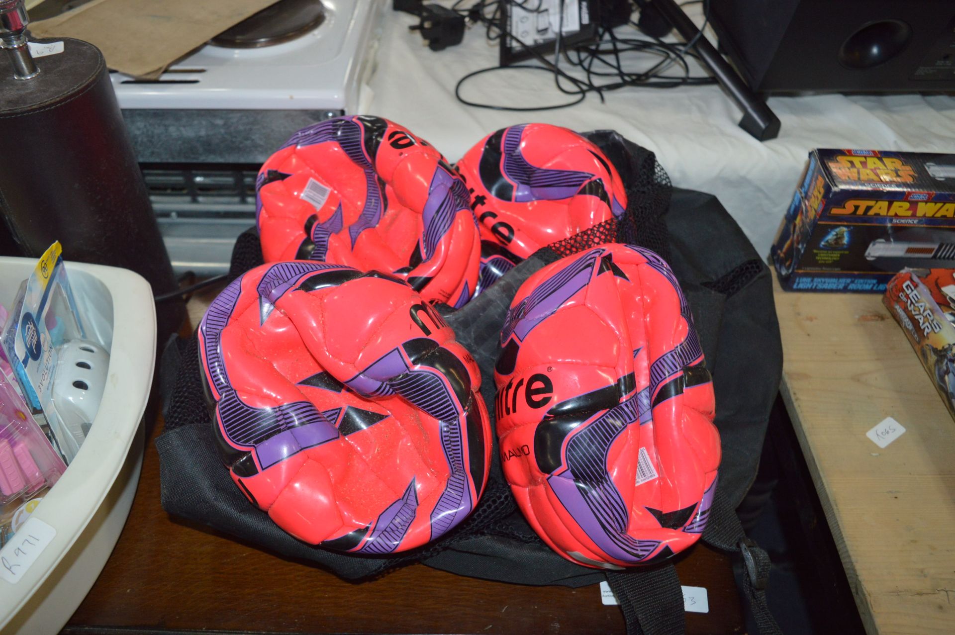 Bag Containing 4 Mitre Footballs