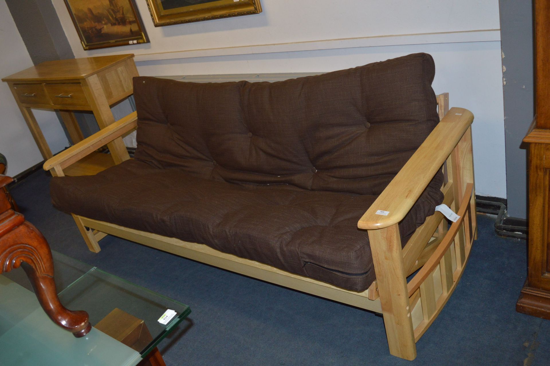 Large Wooden Futon with Brown Seat cushions