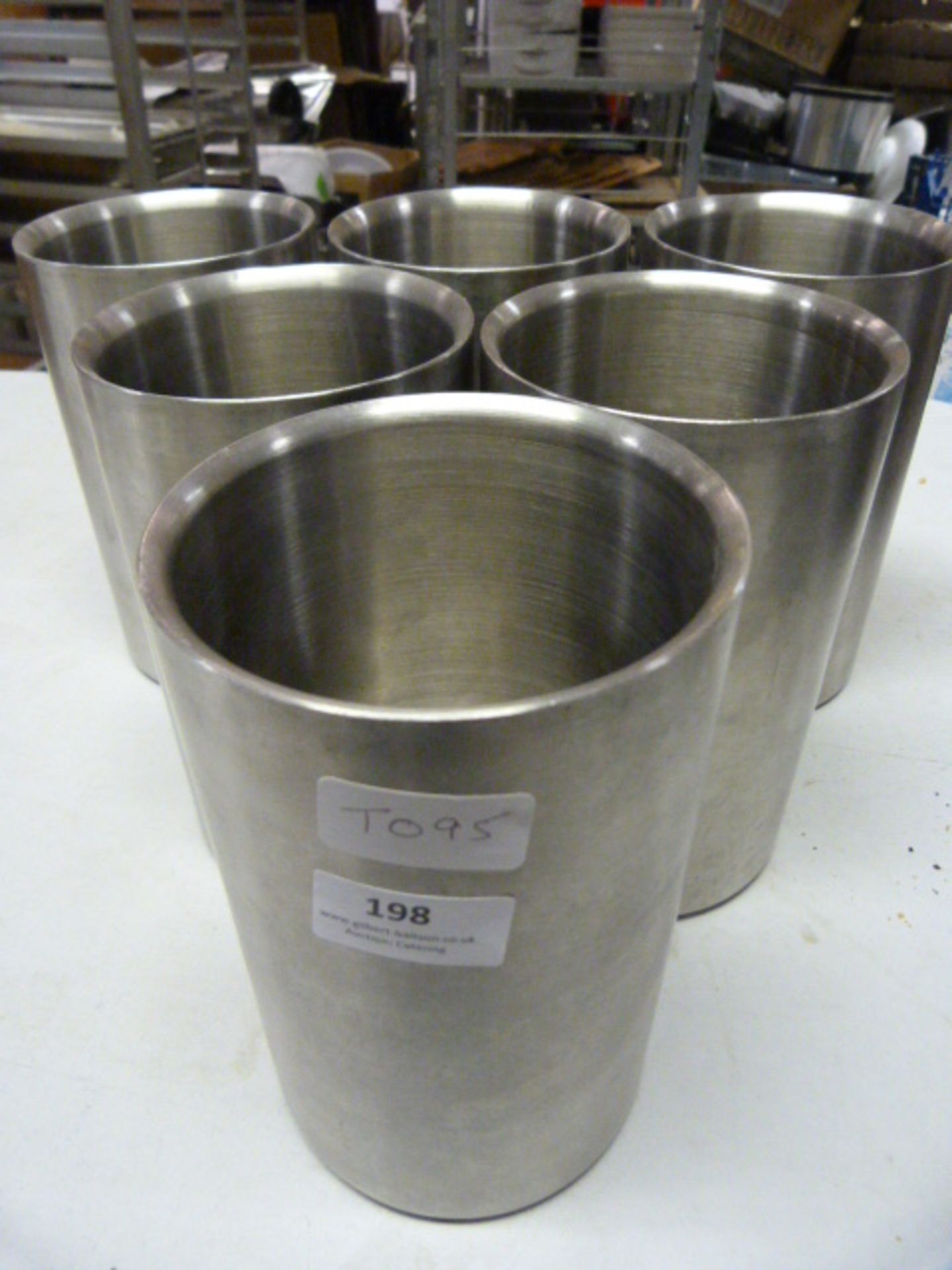 *Six Stainless Steel Utensil Pots