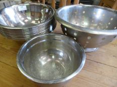 *Twenty Stainless Steel Bowls and a Colander