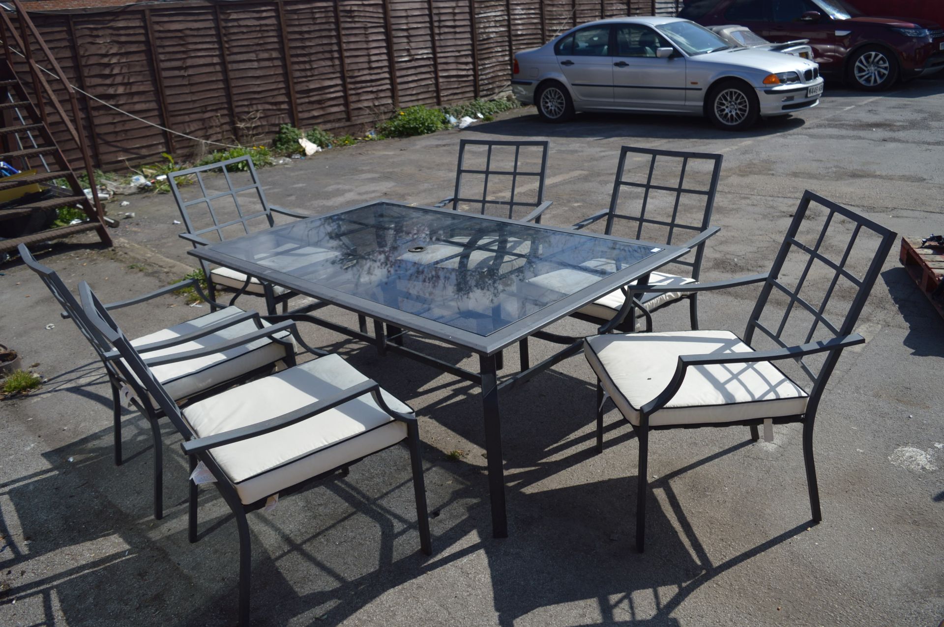 Metal Framed Garden Table With Smoked Glass Top a