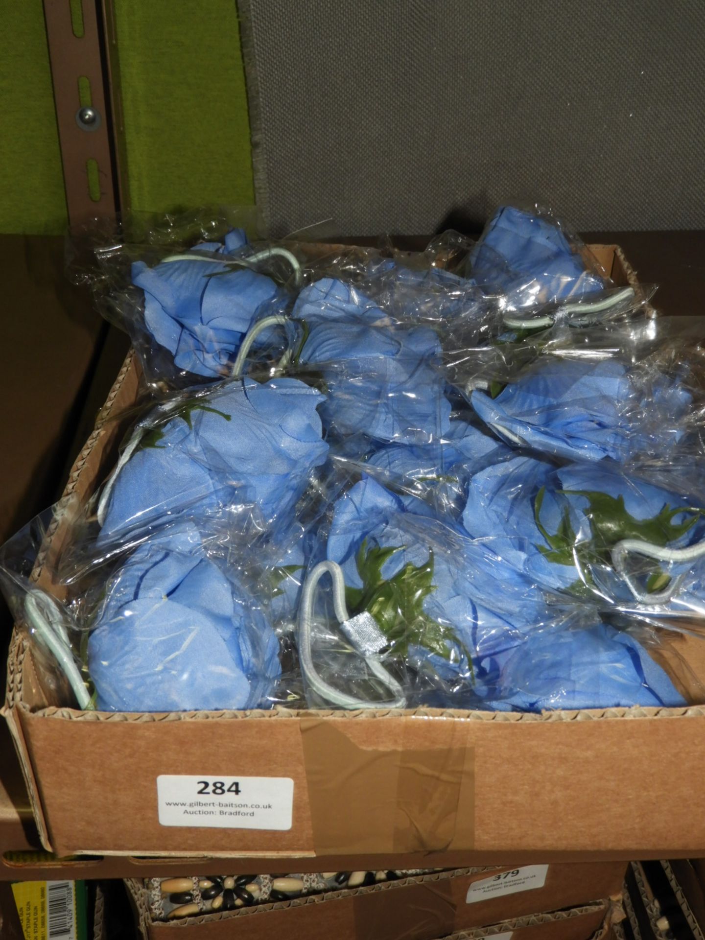 Box Containing 20 Blue Floral Fascinators