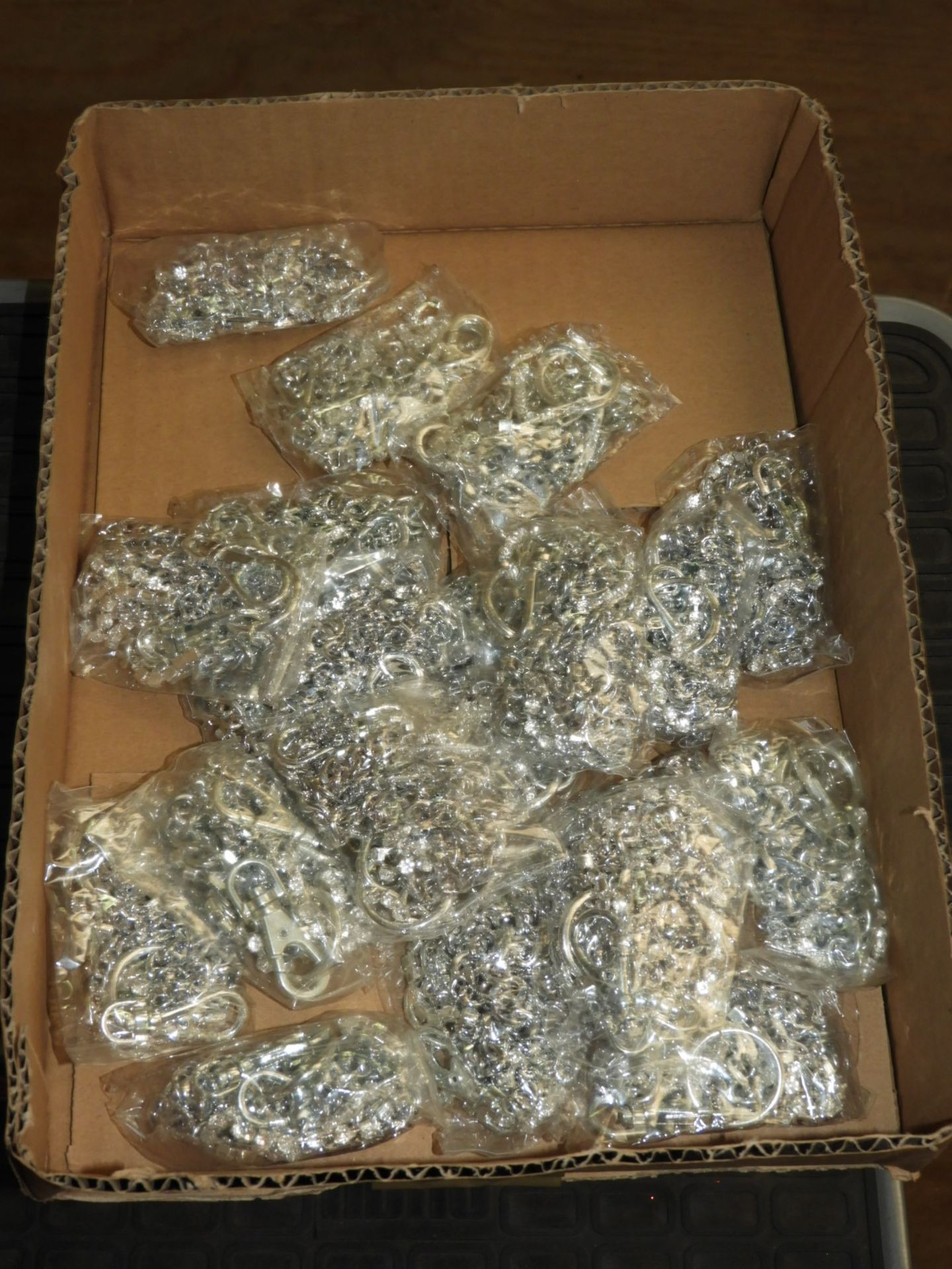 Box Containing 20 Packs of Chrome Keychains with H