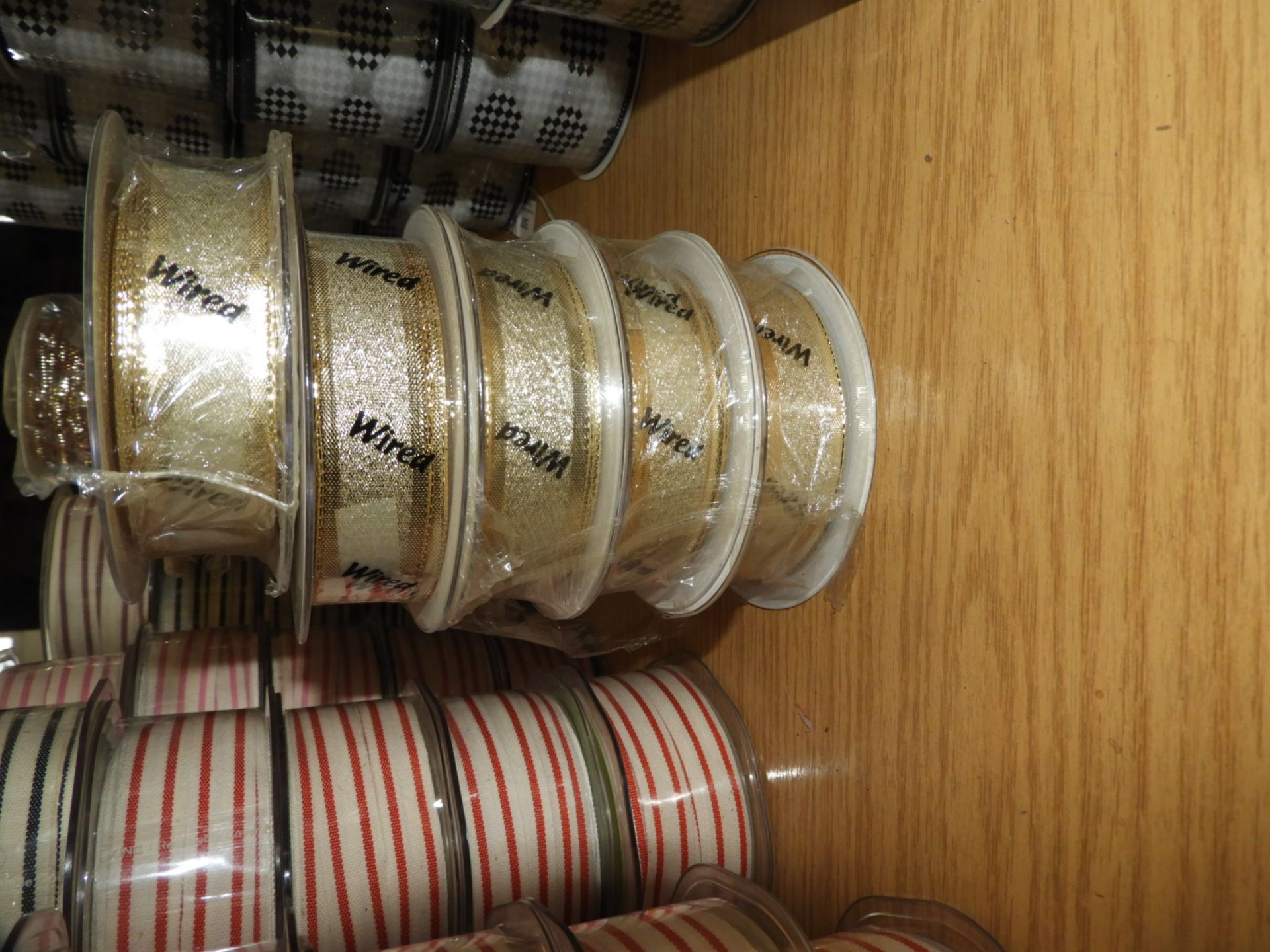 Five Rolls of Gold Metallic Ribbon