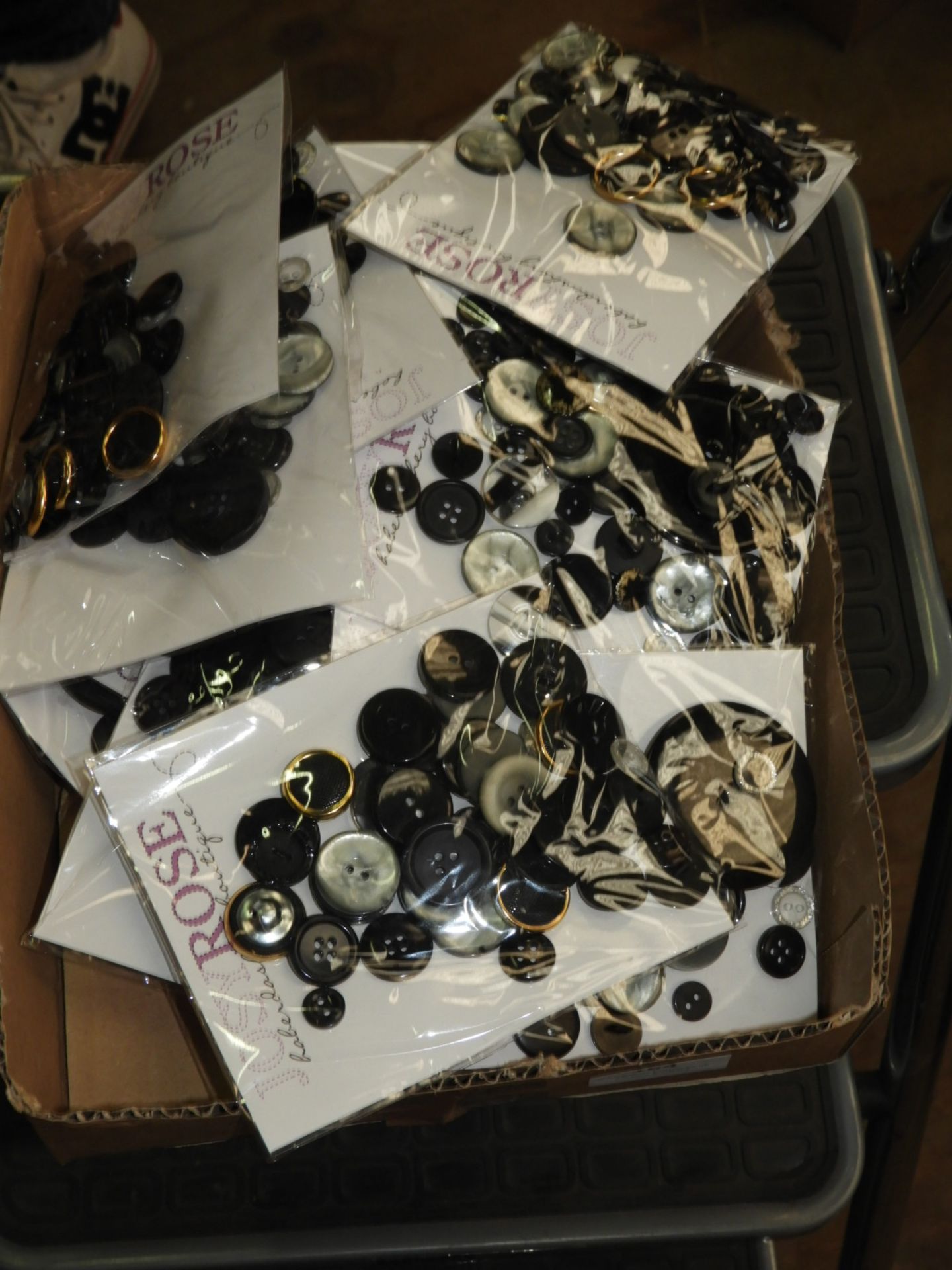 Box Containing 20 Packs of Buttons