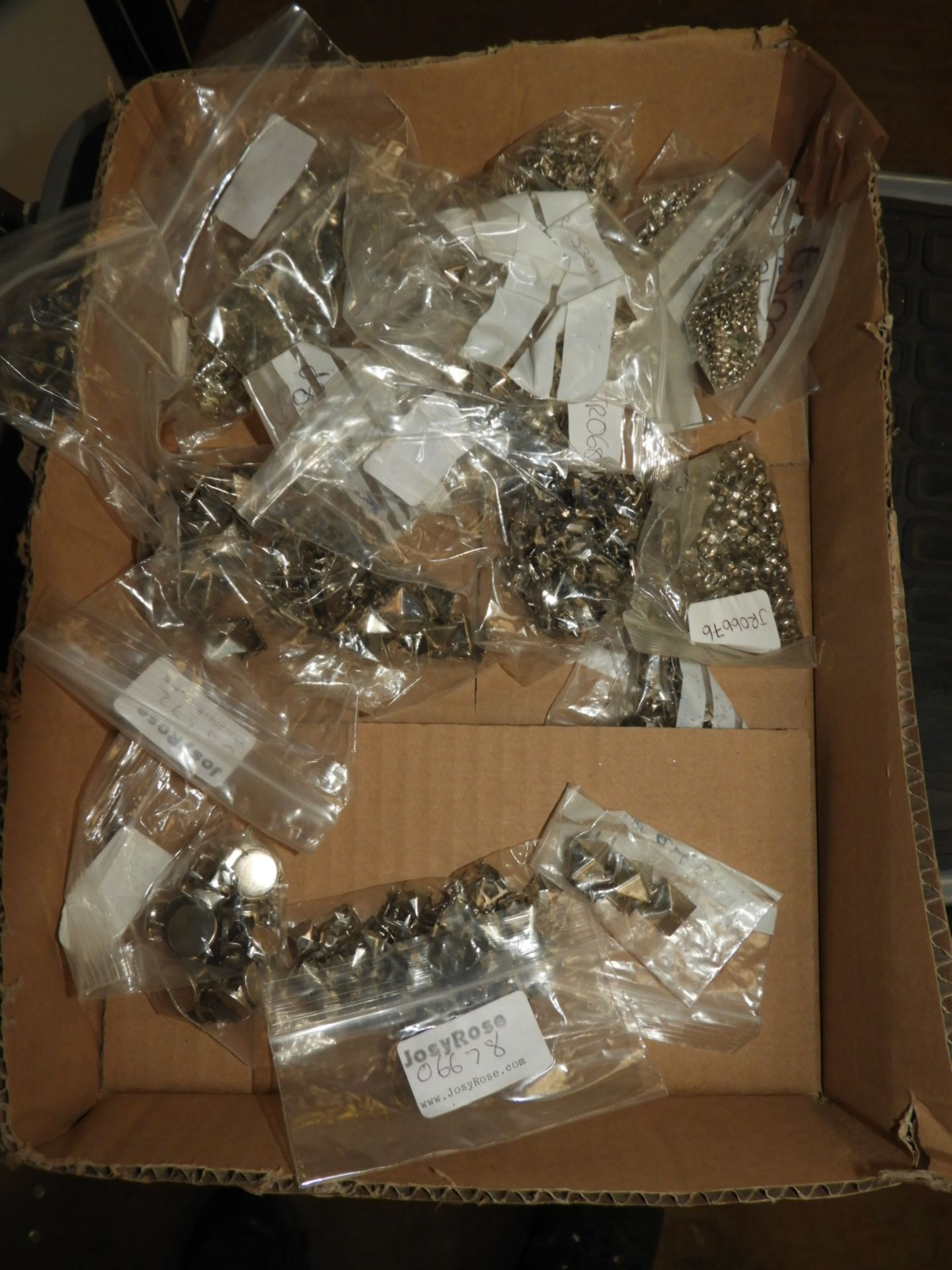 Box Containing Metal Beads and Studs