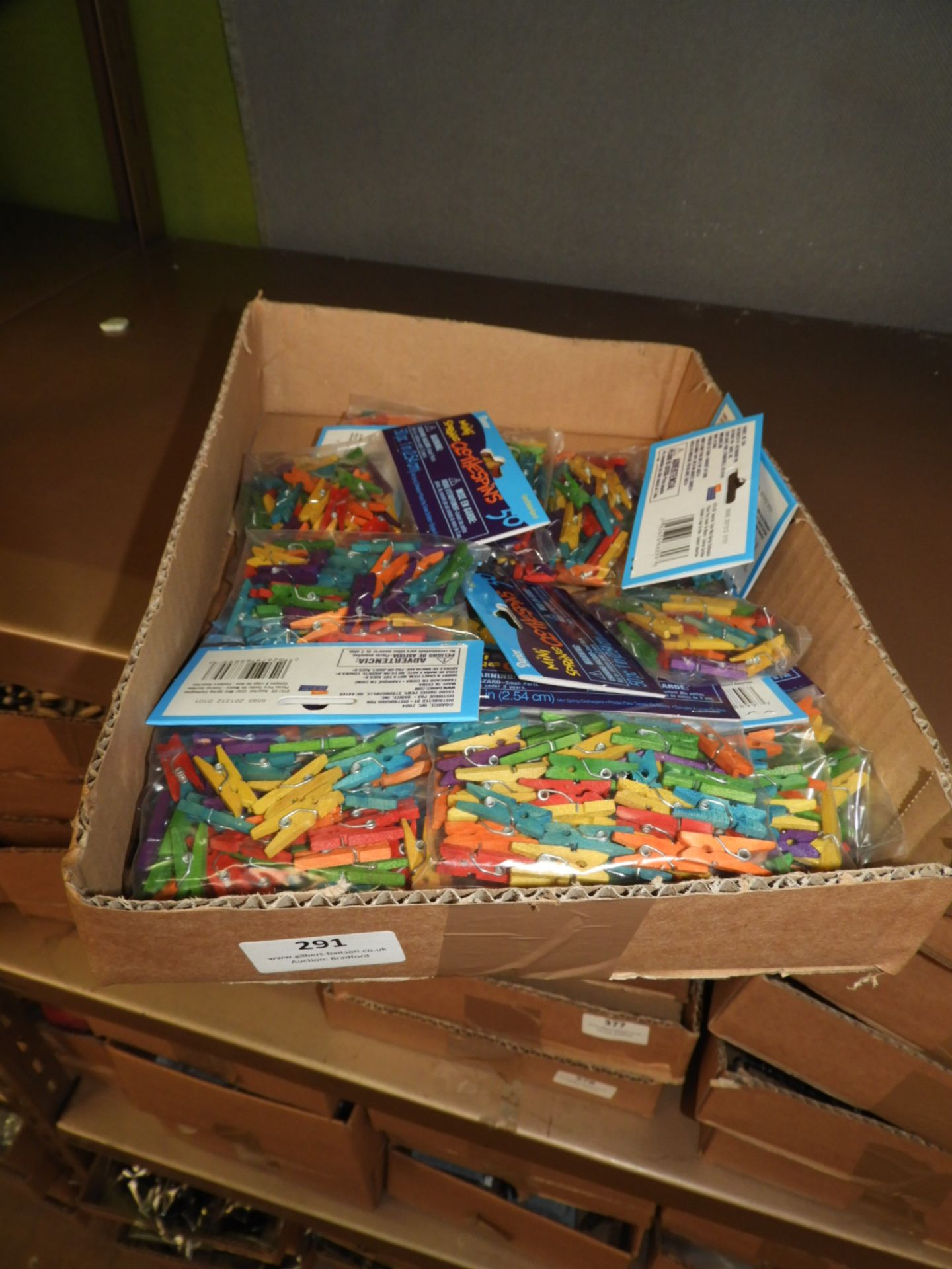 Box Containing 20 packs of Miniature Clothes Pegs