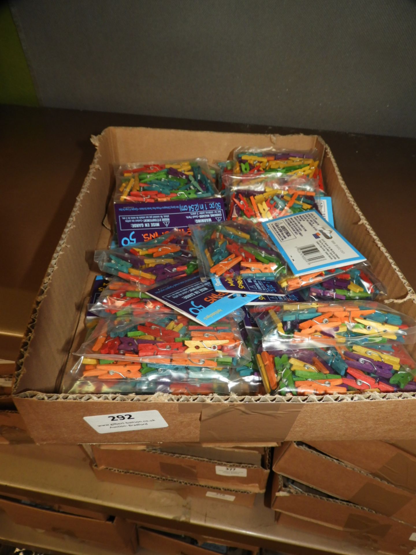 Box Containing 20 packs of Miniature Clothes Pegs