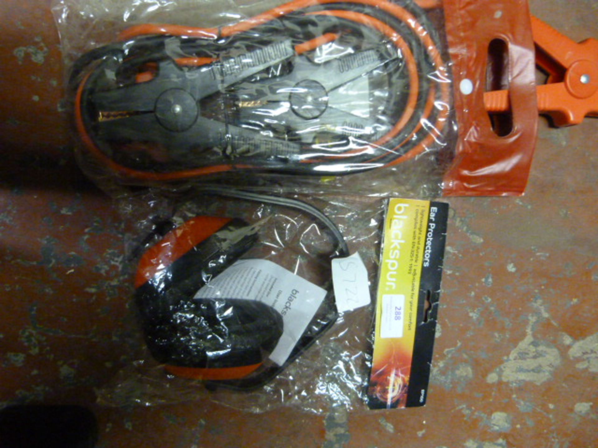 Black Spur Ear Protectors and a Set of Jump Leads