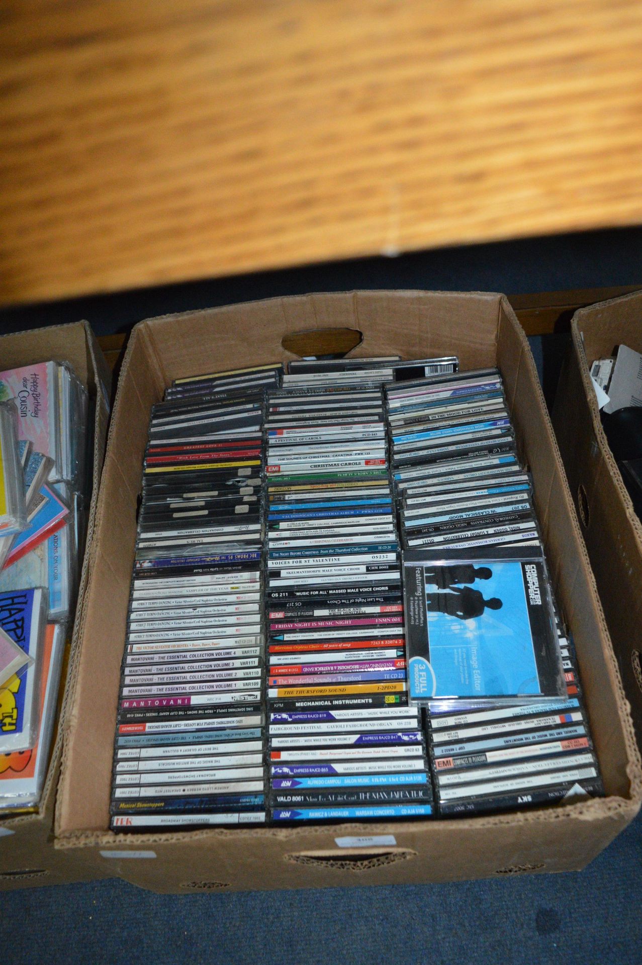Box Containing a Large Quantity of CDs