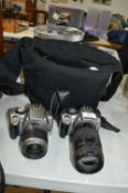 Two Canon Cameras and a Camera Bag