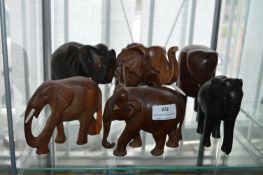 Six Carved Hardwood Elephants