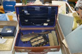 Small Suitcase Containing Vintage Brushes