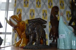 Four Assorted Elephants Including Candle Stand, et