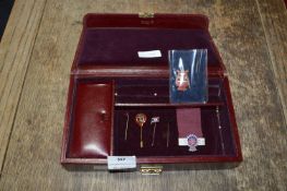 Small Leather Case Containing Badges, Stick Pins,